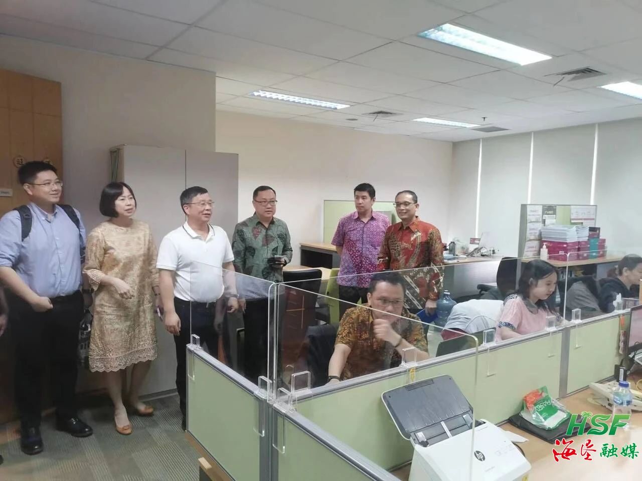 包洪文一行到KM公司调研。